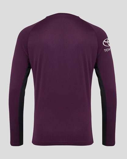 Back view of a purple England Cricket training long sleeve tee with black side panels and a white logo on the right sleeve.