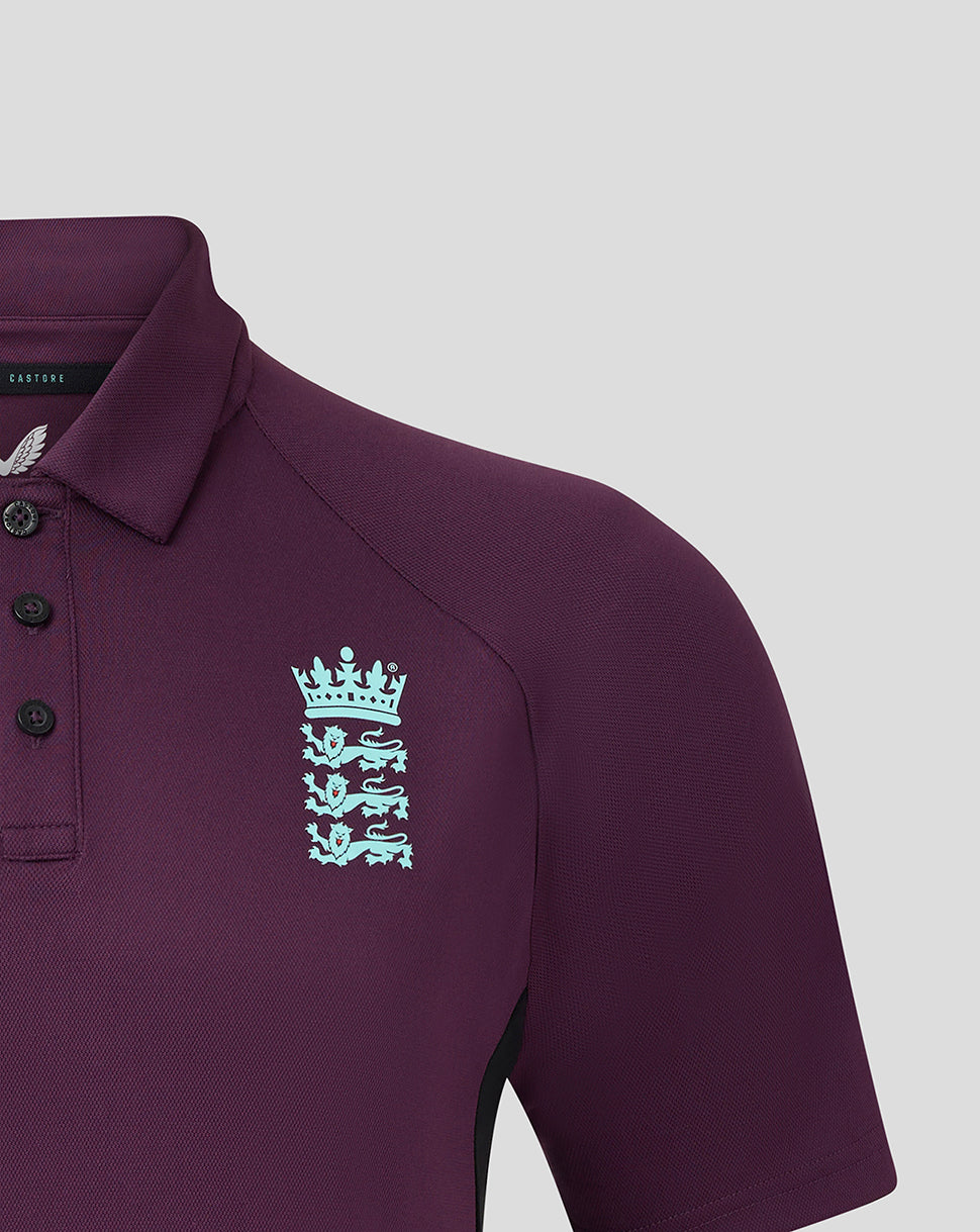 Left chest view of burgundy polo featuring light blue England crest