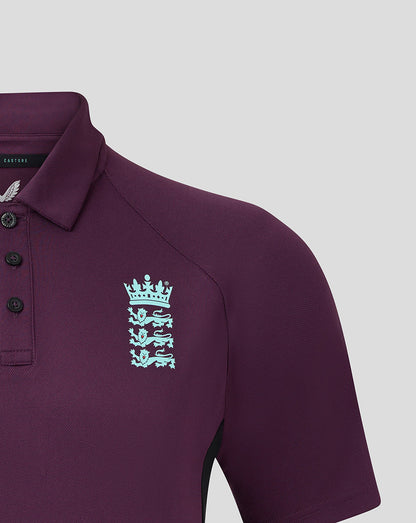 Left chest view of burgundy polo featuring light blue England crest