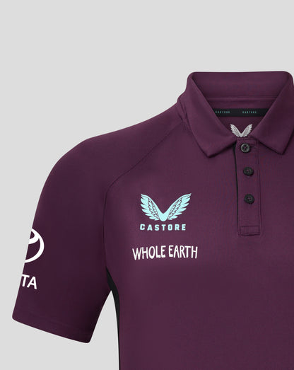 Close up of the polo collar on a maroon England cricket shirt with a Castore label inside and a pale emblem on the chest
