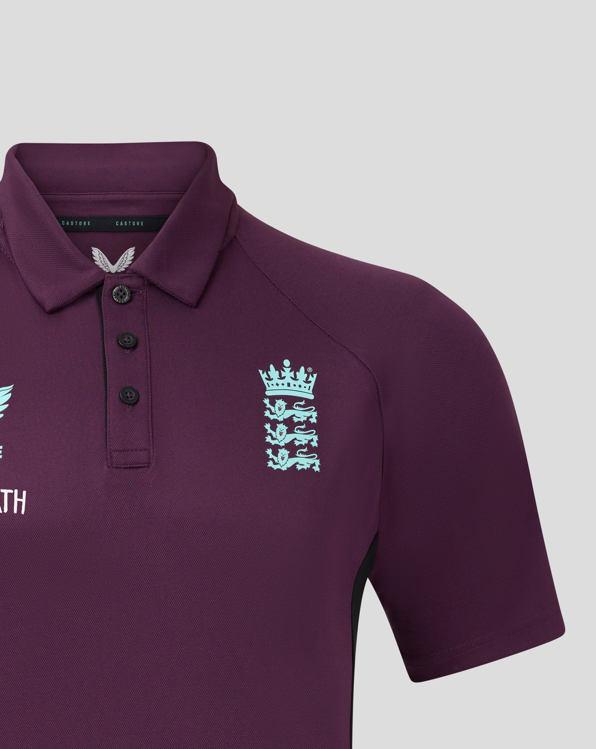 Pale blue England crest motif along the front of the maroon polo with a button placket