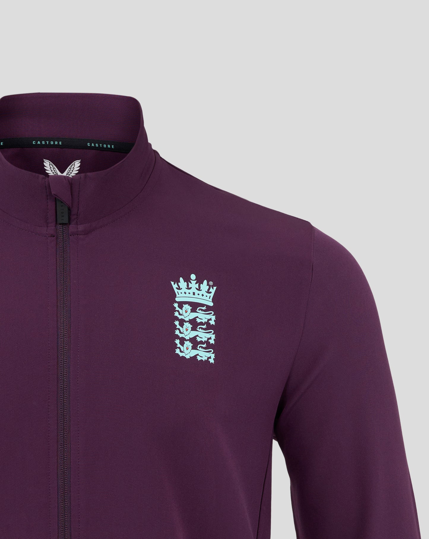 Close up of the jacket collar showing Castore branding and a white crest on the England 25/26 Anthem Jacket