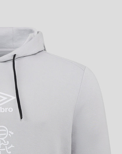 Shoulder close up of light grey Rangers hoodie highlighting textured fabric and a white Umbro crest on the chest