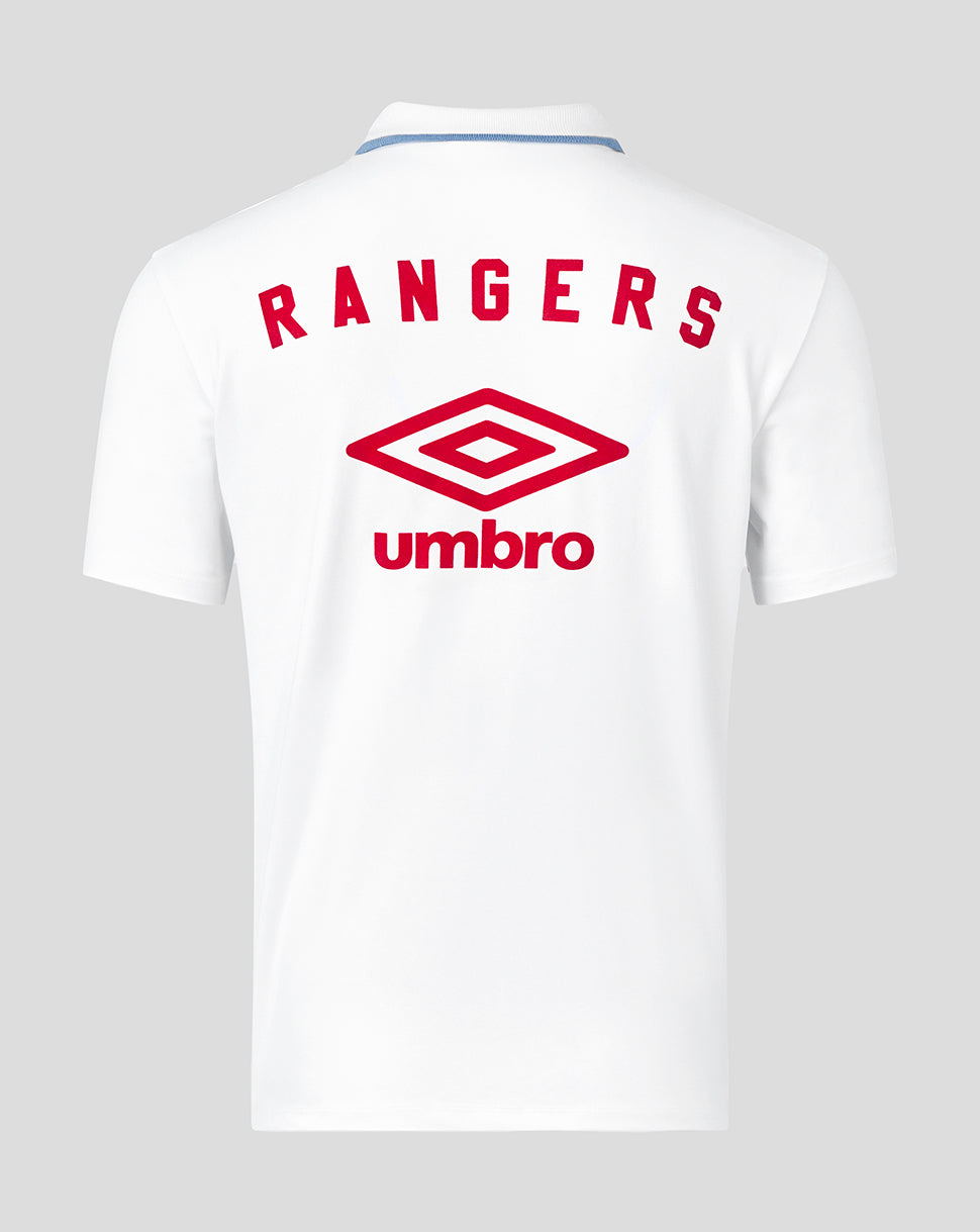 Back view of white Rangers polo with bold red RANGERS lettering across the upper back and Umbro logo beneath.