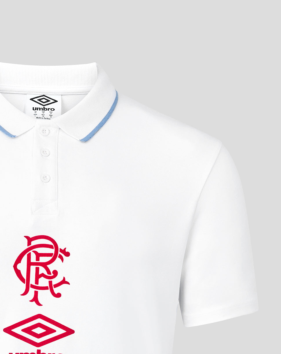 Close up of collar and chest on white Rangers polo showing red club crest and Umbro logo.