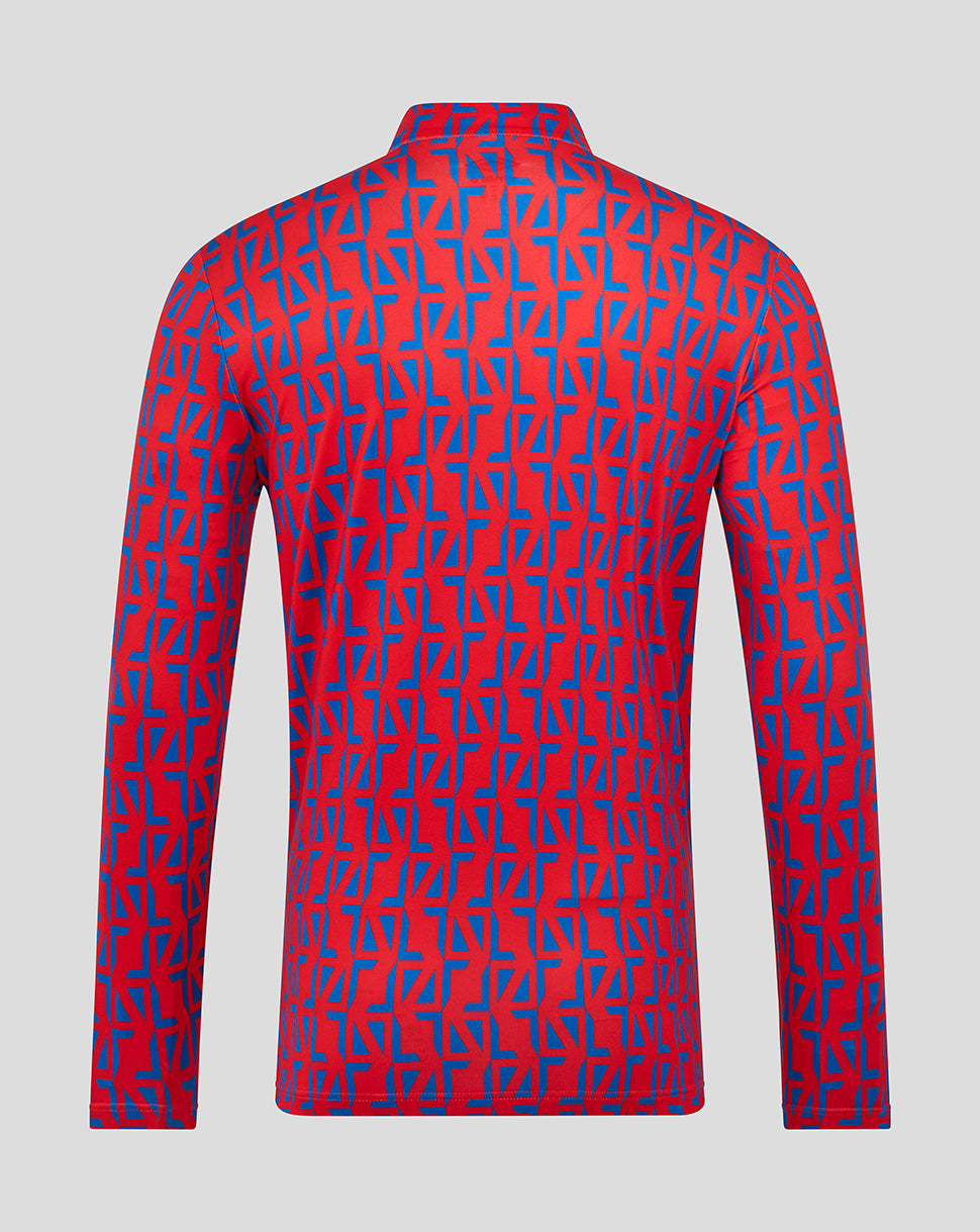 Back view of Rangers away matchday zip top with red and blue geometric print.