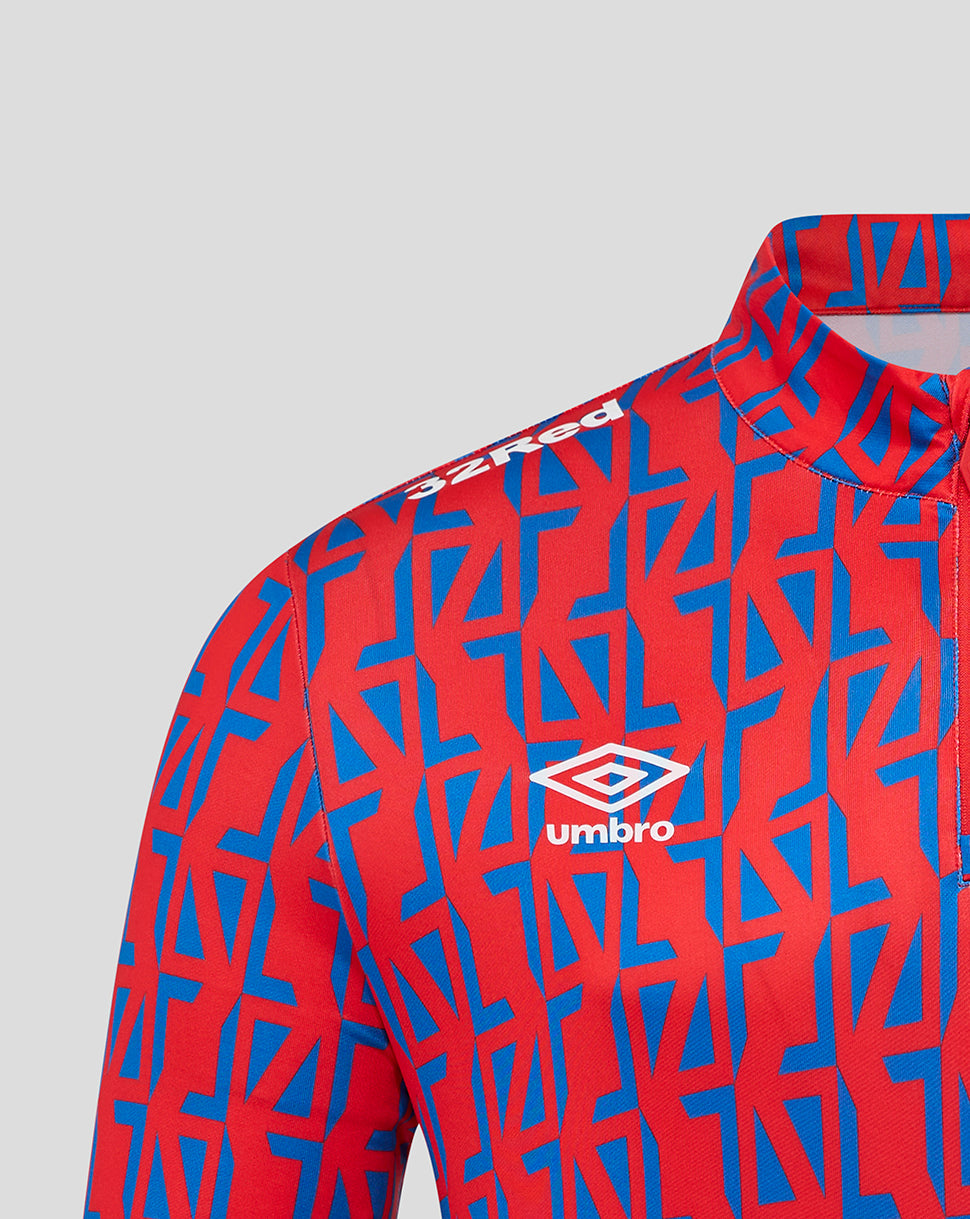 Front view of red and blue patterned Rangers top with Umbro logo on chest.