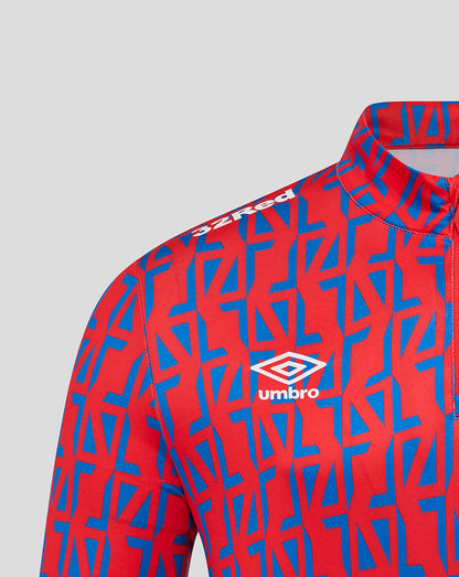 Front view of red and blue patterned Rangers top with Umbro logo on chest.