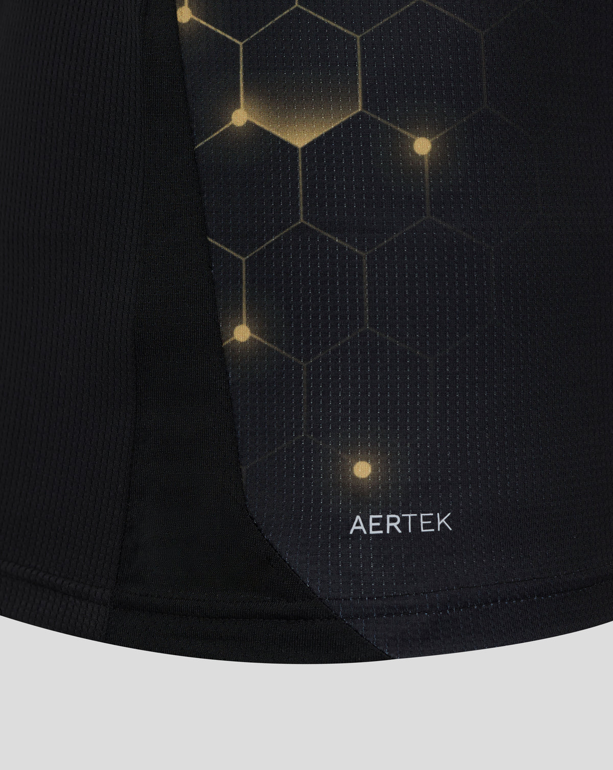 Close up of black AERTEK fabric with hex pattern on Burnley FC 25/26 third shirt