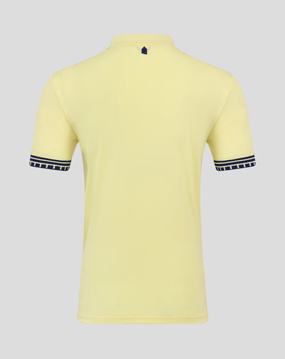 Junior Everton 25/26 away short sleeve shirt in pale yellow viewed from the back with a small navy shield at the neckline and Castore branding inside the collar.