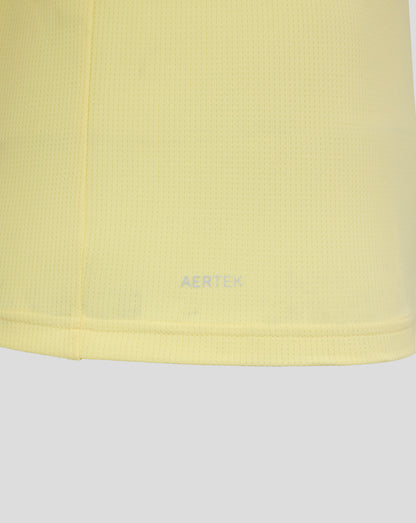 Close up of pale yellow mesh fabric from Everton FC 25/26 junior away short sleeve shirt.