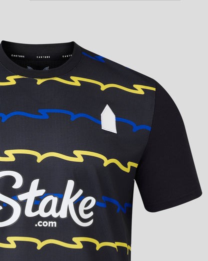 Close up of Everton 25/26 Men's Third Shirt showing bright yellow graphic across the chest on navy fabric with a white logo detail.