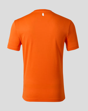 Back view of bright orange Everton third goalkeeper shirt with subtle texture and a small white emblem at the neck