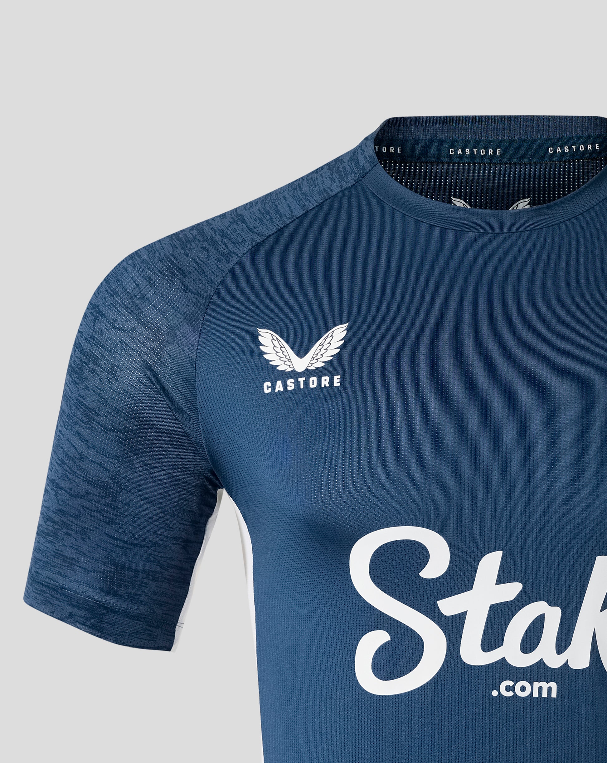Close up of shoulder and neckline on Everton Moonlit Ocean T-shirt showing textured sleeve fabric and Castore trim.