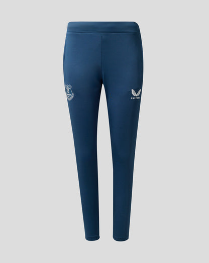 Back view of Moonlit Ocean blue Everton FC performance knit pants showing a crest on the left leg and a winged logo on the right.