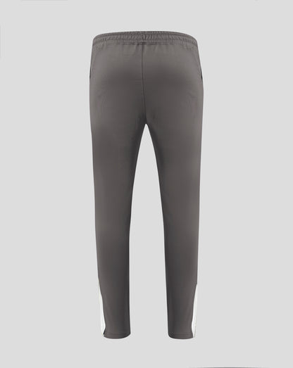 Back view of dark gray Everton performance knit pants with crest on the left thigh.