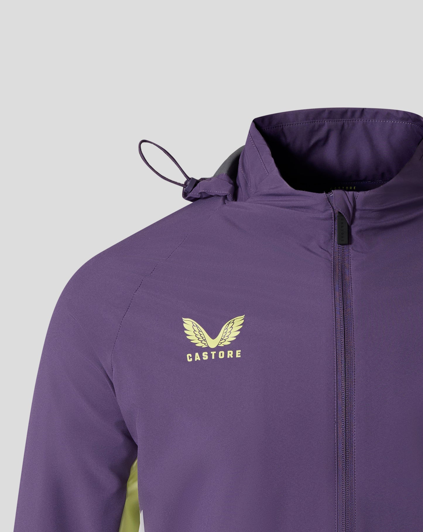 Close up of purple hooded jacket showing chest Castore logo and Everton crest