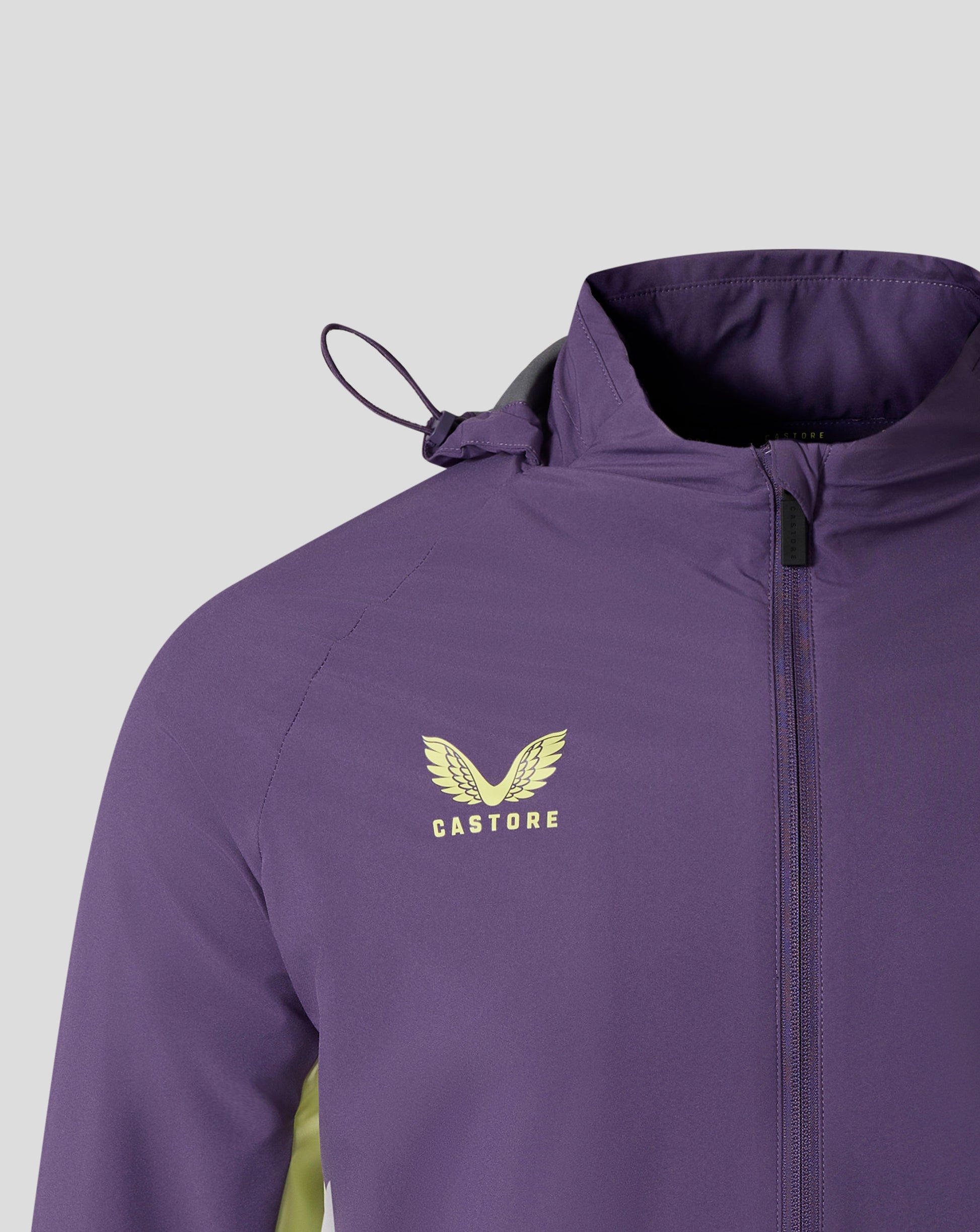 Close up of purple hooded jacket showing chest Castore logo and Everton crest
