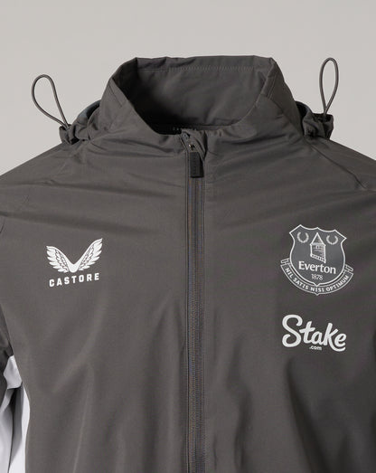 Close up of the chest area with Castore logo on the left, Everton crest on the right, and Stake logo visible on the front.