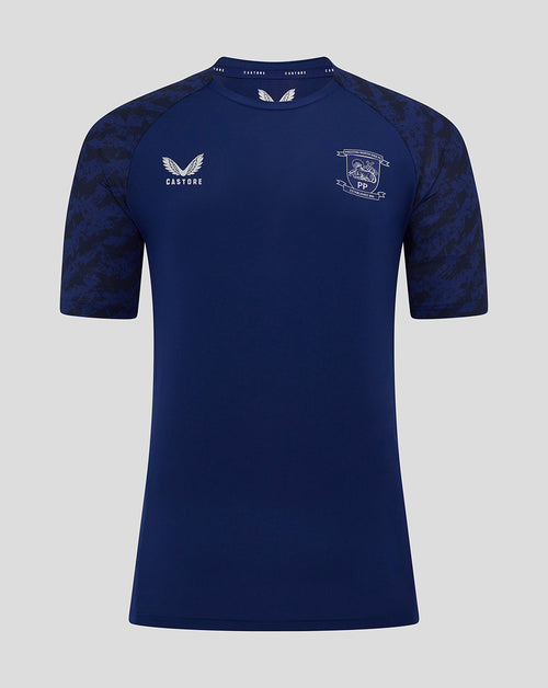 Front view of blue Preston training T shirt with patterned sleeves and a chest crest beside the Castore logo.