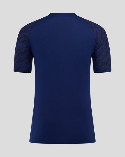Back view of blue Preston training T shirt with camo patterned sleeves.