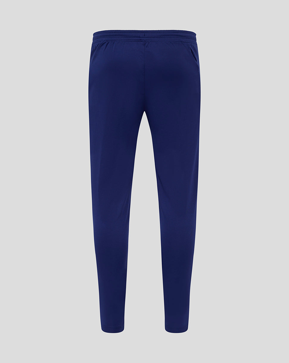 Back view of blue Preston training pants without pockets with an elasticated waistband.