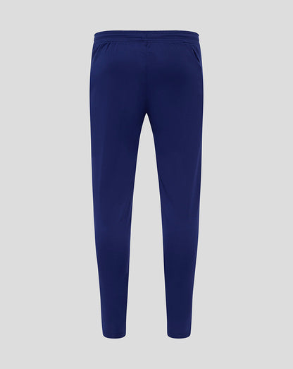 Back view of blue Preston training pants without pockets with an elasticated waistband.