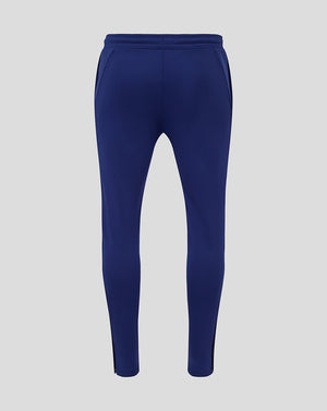 Back view of blue Preston training knit pants with elastic waistband