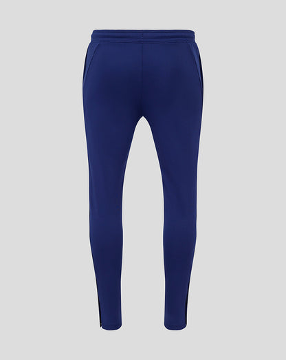 Back view of blue Preston training knit pants with elastic waistband