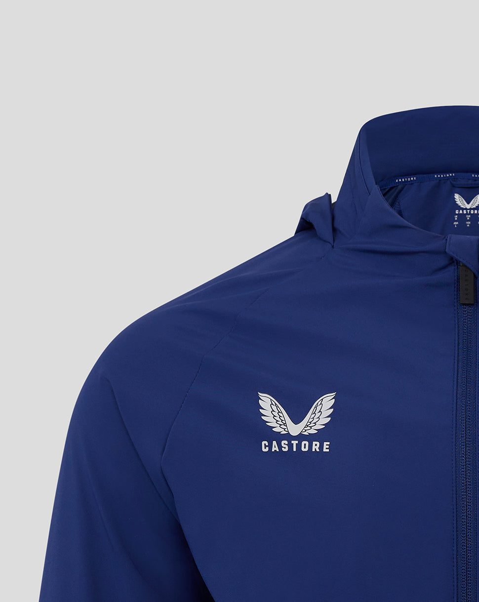 Blue training jacket chest area with Castore logo