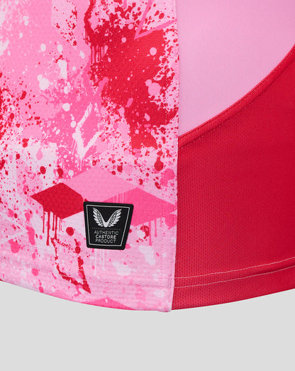 Close up of pink splatter fabric on the Harlequins away pro shirt showing the authentic Castore product badge.