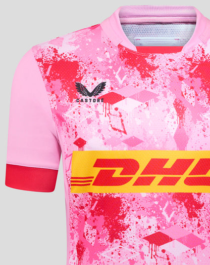 Harlequins away pro shirt in pink splatter design with a bold DHL stripe across the chest.