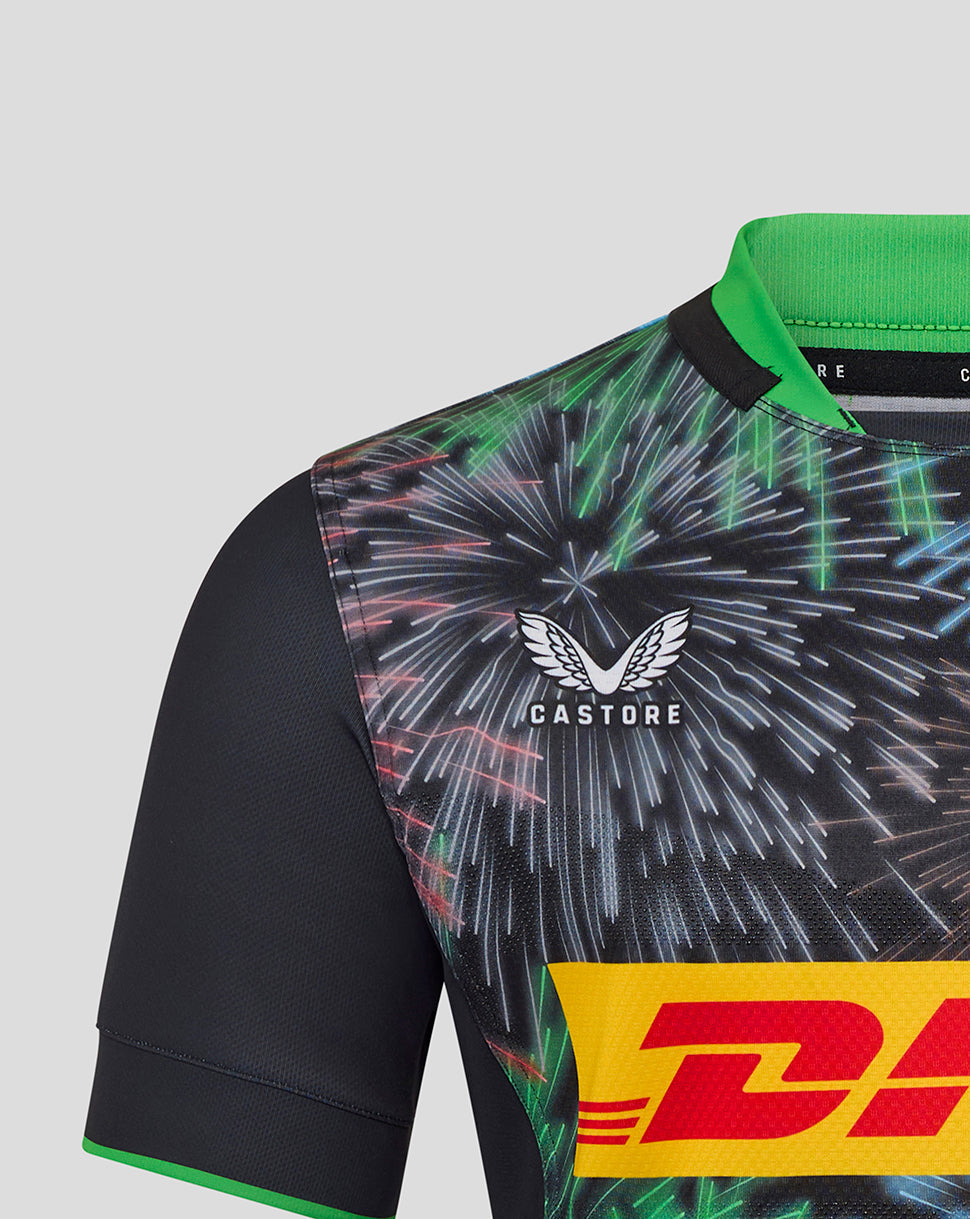 Close up of Harlequins Pro Shirt shoulder area showing the Castore logo and Harlequins crest on a fireworks pattern.