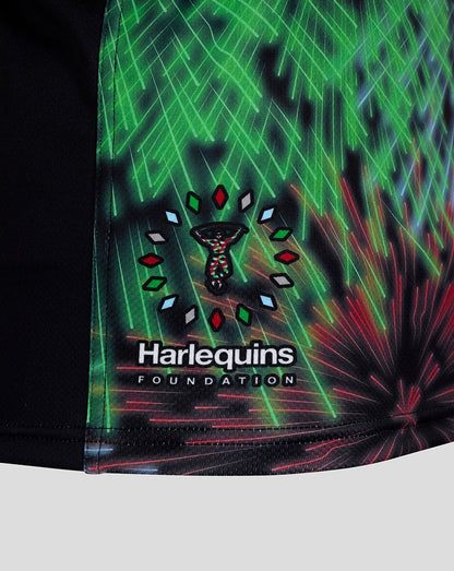 Harlequins crest on a vibrant fireworks print jersey with green and blue accents.