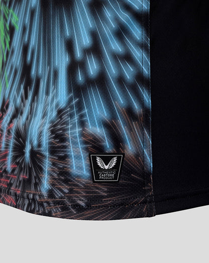 Hem detail of the Harlequins shirt showing fireworks print and Castore authentication badge.