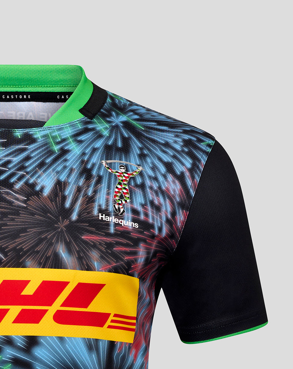 Close up of Harlequins Big Game replica shirt with bright fireworks print, green collar, Harlequins crest and DHL sponsor band.