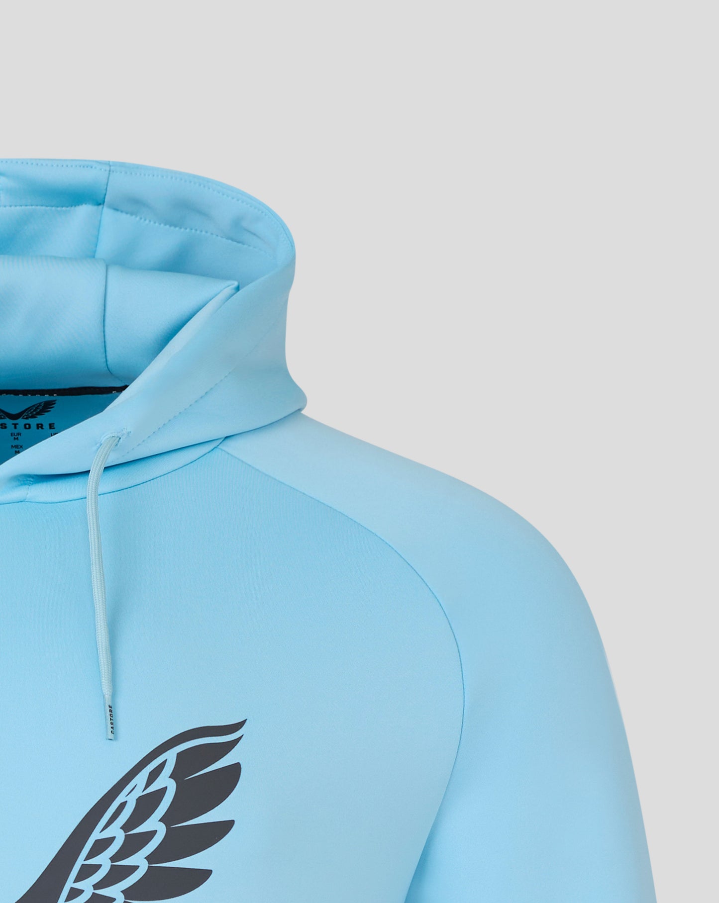 Close up of the blue hoodie hood and shoulder showing soft fabric and stitching