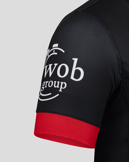 Black Saracens Pro Home Shirt sleeve with white sponsor logo and red cuff