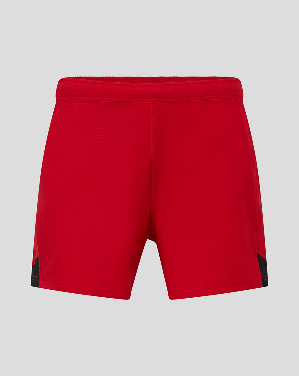 Back view of red Saracens Pro Home Shorts showing black side panels and elastic waistband