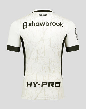Back view of white Saracens junior replica away shirt with marble pattern black side panels SHAWBROOK across the upper back and HY-PRO logo at the hem