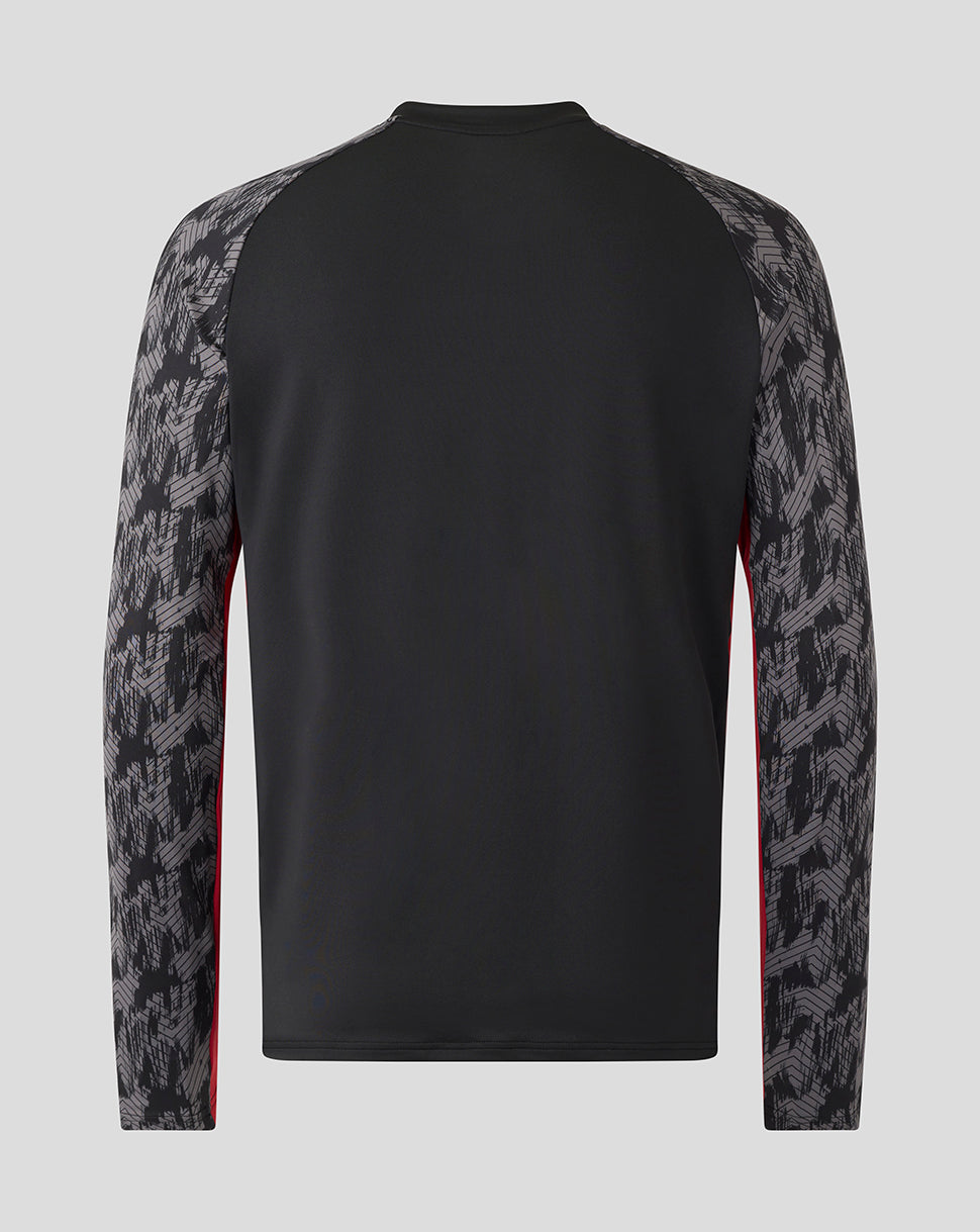 Back view of a black Saracens training drill top with dark grey patterned sleeves
