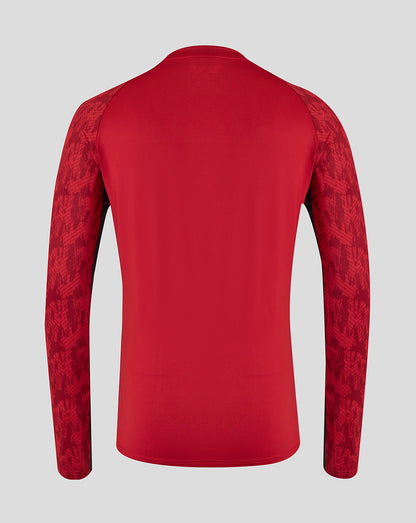 Back view of Saracens training drill top in rhythmic red with patterned sleeves.