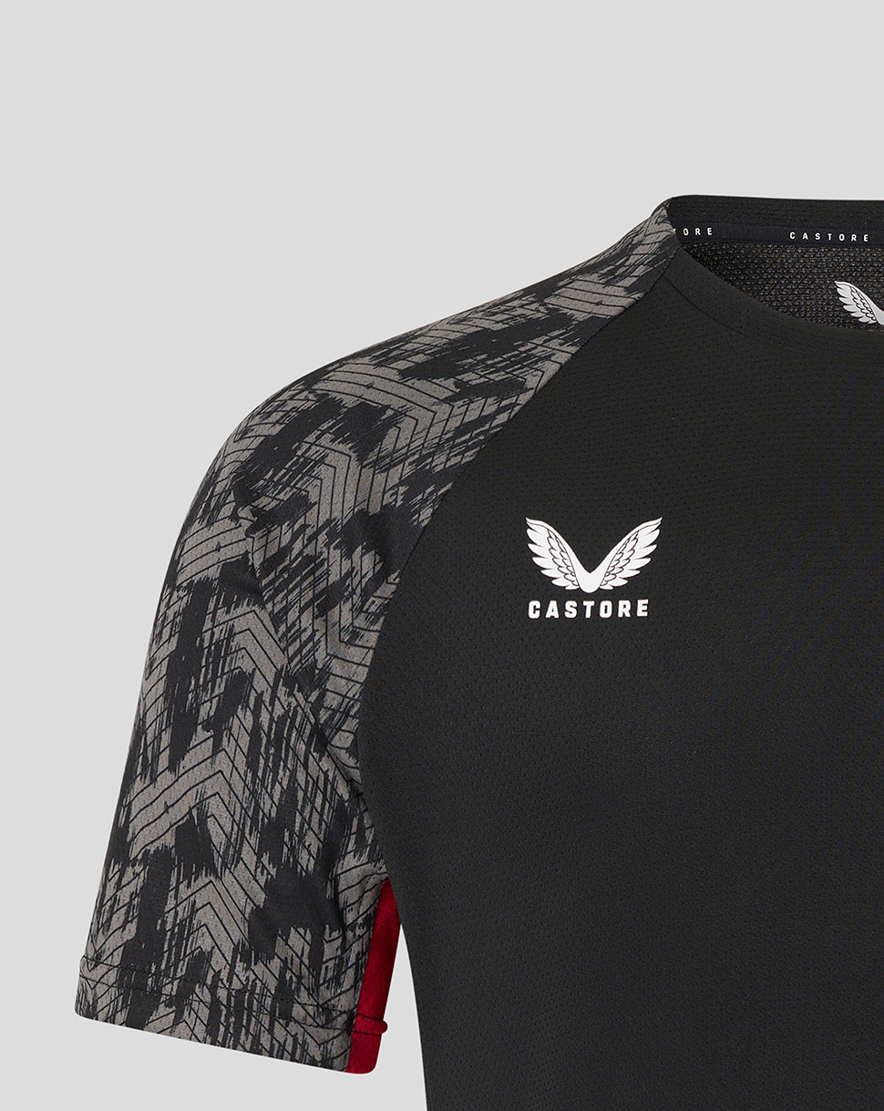 Front view of red Saracens training top with StoneX across the chest and white team logos.