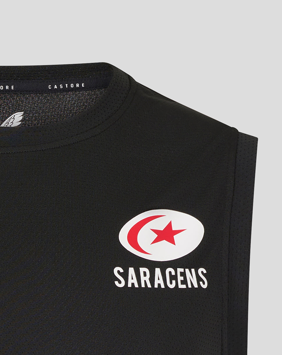 Close-up of upper chest on black Saracens vest showing the crest and branding.