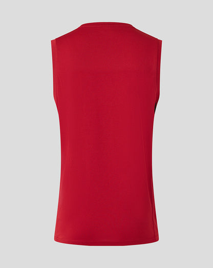Back view of rhythmic red Saracens training vest against a light gray background