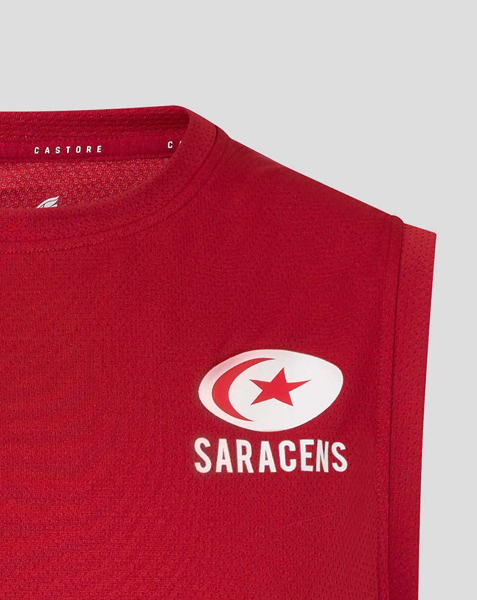 Close-up of red Saracens training vest showing the white Saracens crest on the chest