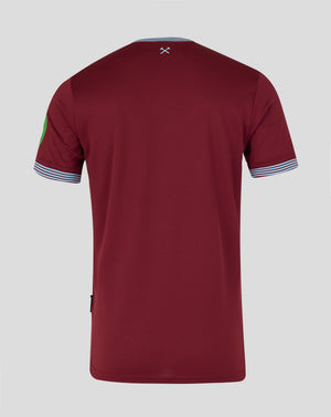 Back view of a maroon West Ham home shirt with a small white crossed hammers emblem at the neckline