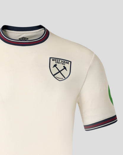 Front view of cream away shirt showing the Umbro logo on the chest and the West Ham crest near the shoulder with a striped collar.