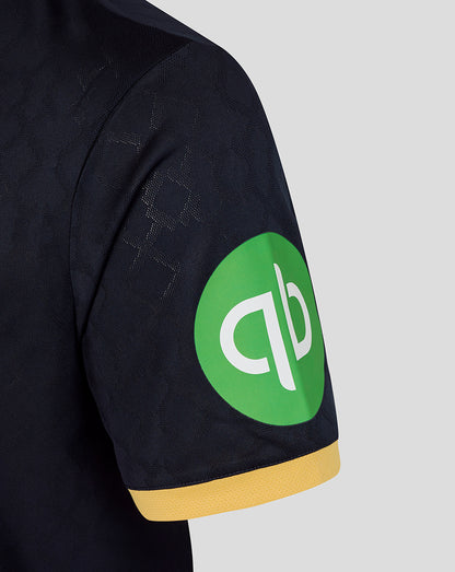 Navy West Ham 25/26 third kit short sleeve shirt showing a bright green circular sponsor patch on the sleeve and yellow cuff.