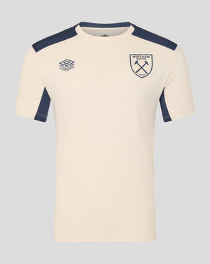 Cream training shirt with navy shoulder panels and West Ham crest on the chest